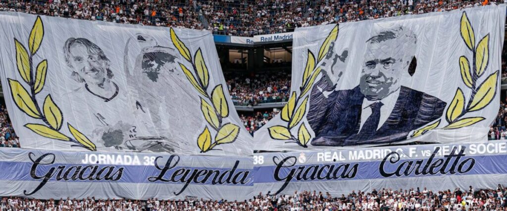 Foto colorida de despedida de Ancelotti e Modric - Metrópoles