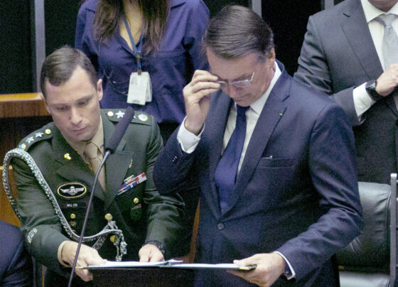 mauro Cid e Bolsonaro durante posse presidencial 2019 no Senado Federal minuta do golpe